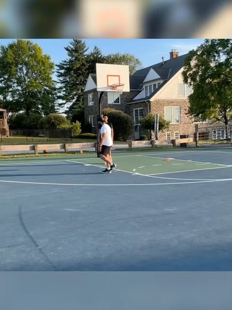 Basketball training on an outdoor court